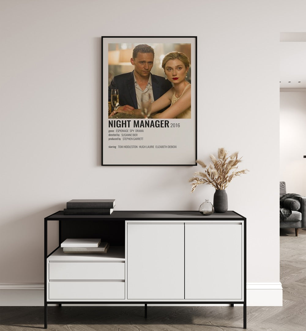 Night Manager 2016 Movie Posters in Black Plain Frame hanging on wall above console table