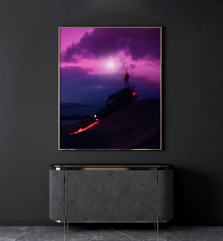 Nightcall By Ritvik Takkar Surreal Art Prints in Gold Plain Frame placed on a Dark Grey Colored Wall above a Console Table in the Drawing Room