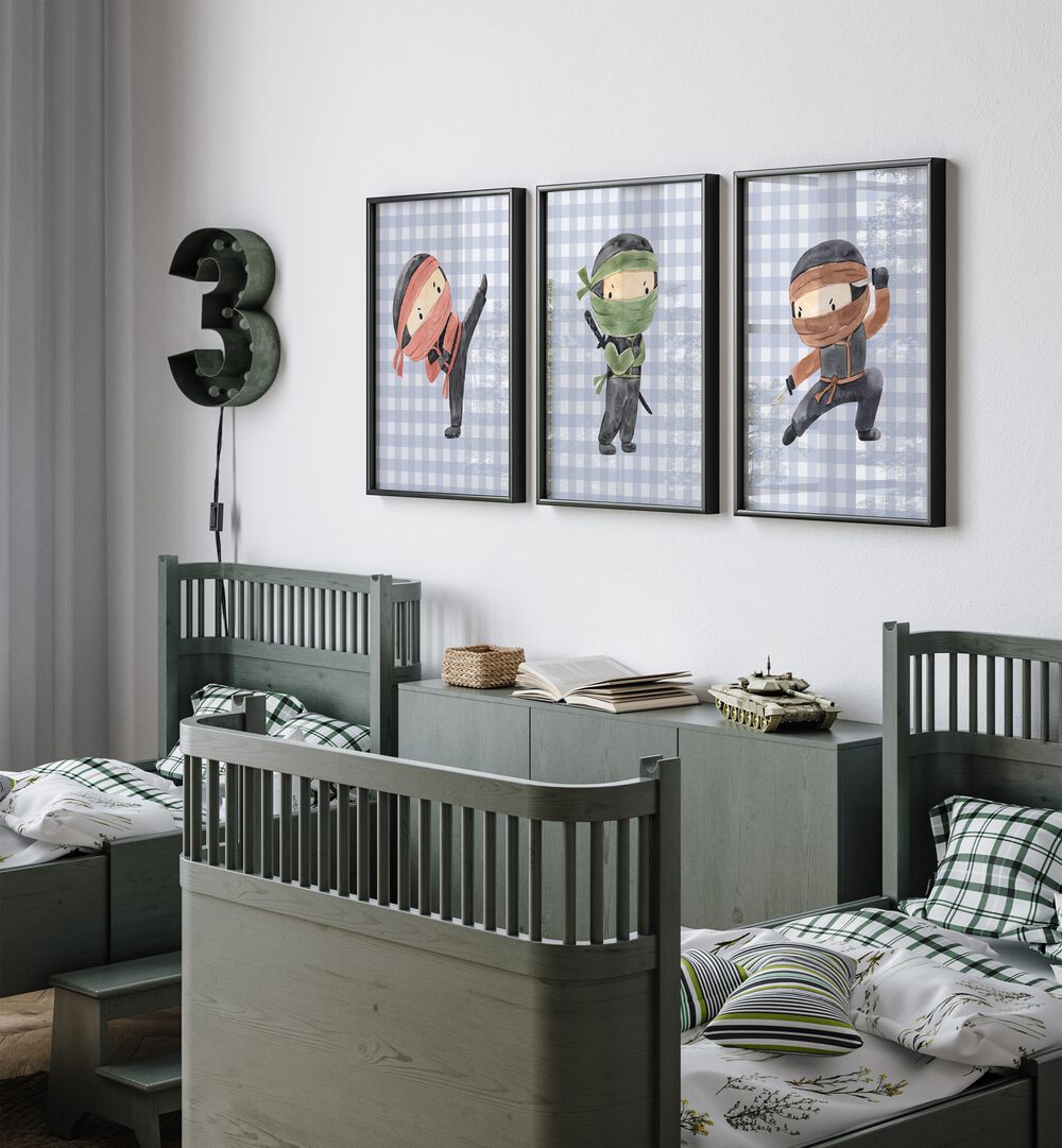 Ninja Set Of 3 Paintings in Black Plain Frame placed on a wall behind infant's bed for kids room