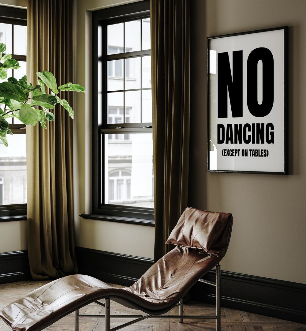 No Dancing by Athene Fritsch Quotes and Typography Posters in Black Plain Frame placed on a living room wall behind a chair and beside a window