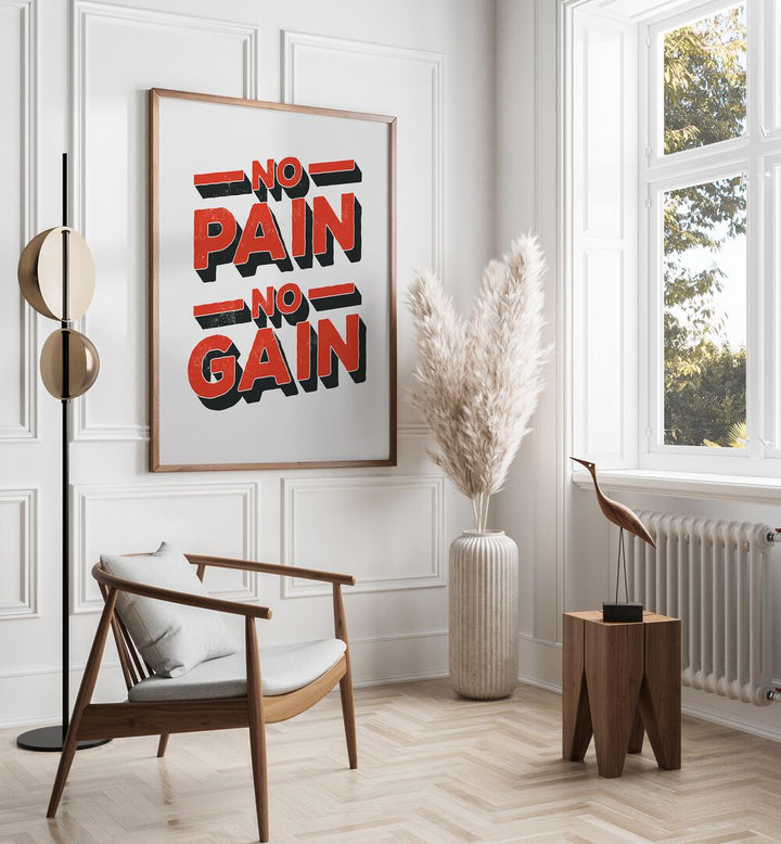 No Pain No Gain Quotes and Typography Posters in Oak Wood Plain Frame placed on a wall beside a chair and window