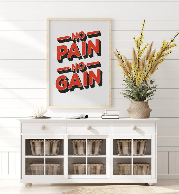 No Pain No Gain Quotes and Typography Posters in Oak Wood Plain Frame placed on a wall behind a white console table