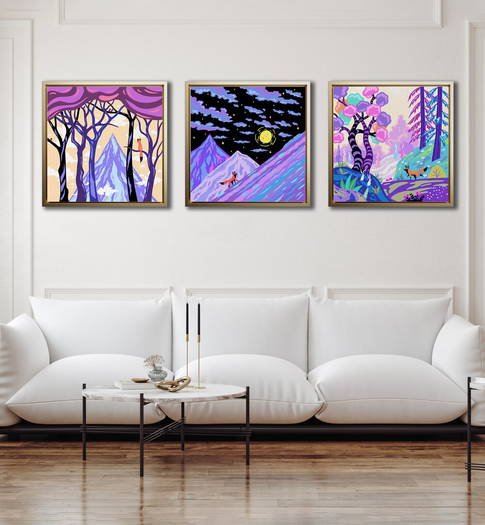 Nomad Fox Set Set Of 3 Paintings in Oak Wood Floater Frame placed on a white wall behind a white sofa