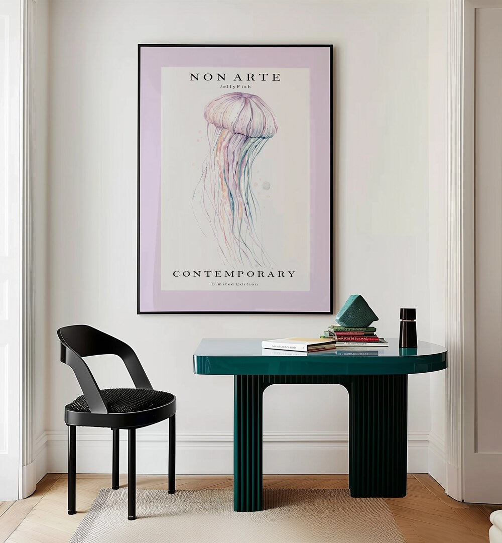 Non Arte Jellyfish By Rikke Londager Boisen Beach Prints in Black Plain Frame placed on a Cream Colored Wall near a Workspace Table in the Drawing Room