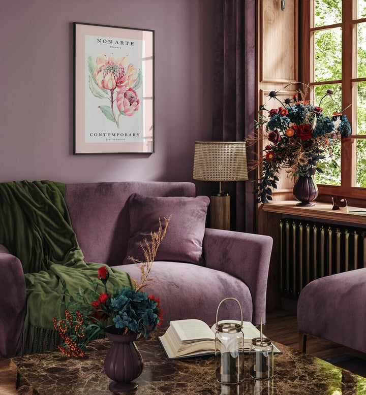 Non Arte Rose Flower By Rikke Londager Boisen Botanical Art Prints in Black Plain Frame placed on a Purple Colored Wall near a Purple Sofa in the Living Room