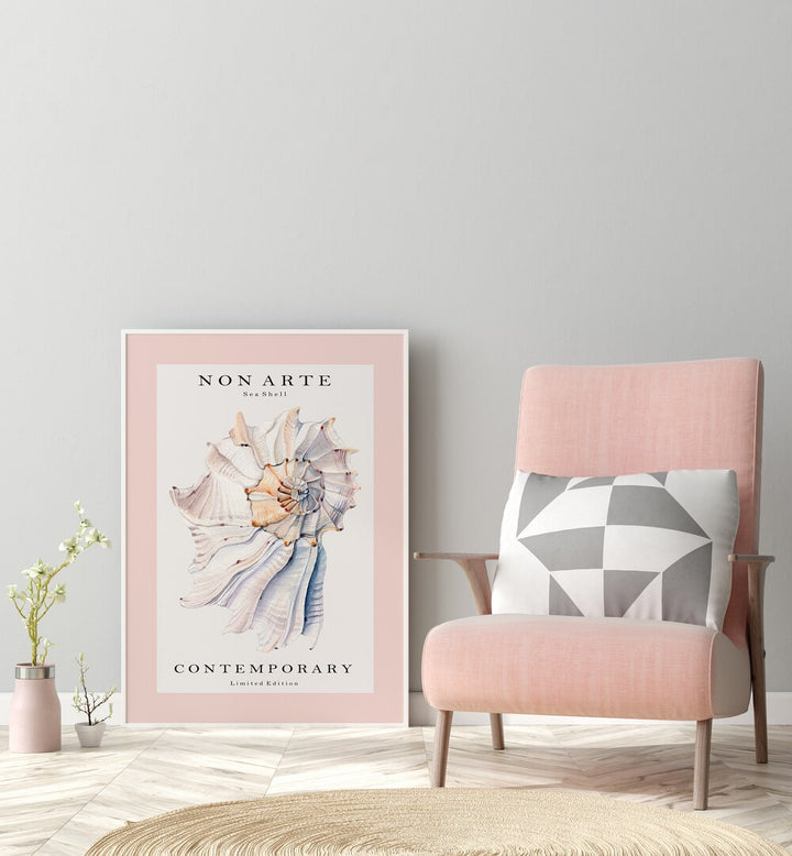 Non Arte Sea Shell I By Rikke Londager Boisen Beach Prints in White Plain Frame placed on the floor near a Grey Colored Wall in the Drawing Room