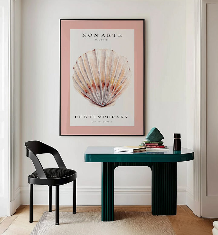 Non Arte Sea Shell II By Rikke Londager Boisen Beach Prints in Black Plain Frame placed on a Cream Colored Wall near a Workspace Table in the Drawing Room