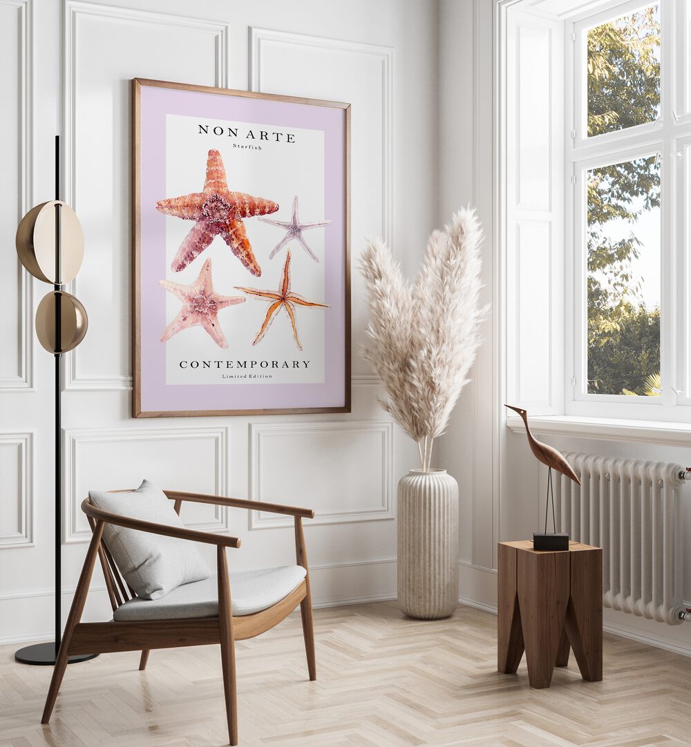 Non Arte Starfish By Rikke Londager Boisen Beach Prints in Oak Wood Plain Frame placed on a White Colored Wall in the Drawing Room