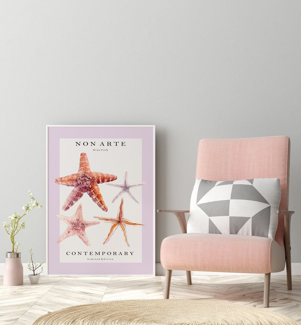 Non Arte Starfish By Rikke Londager Boisen Beach Prints in White Plain Frame placed on the floor near a Grey Colored Wall in the Drawing Room