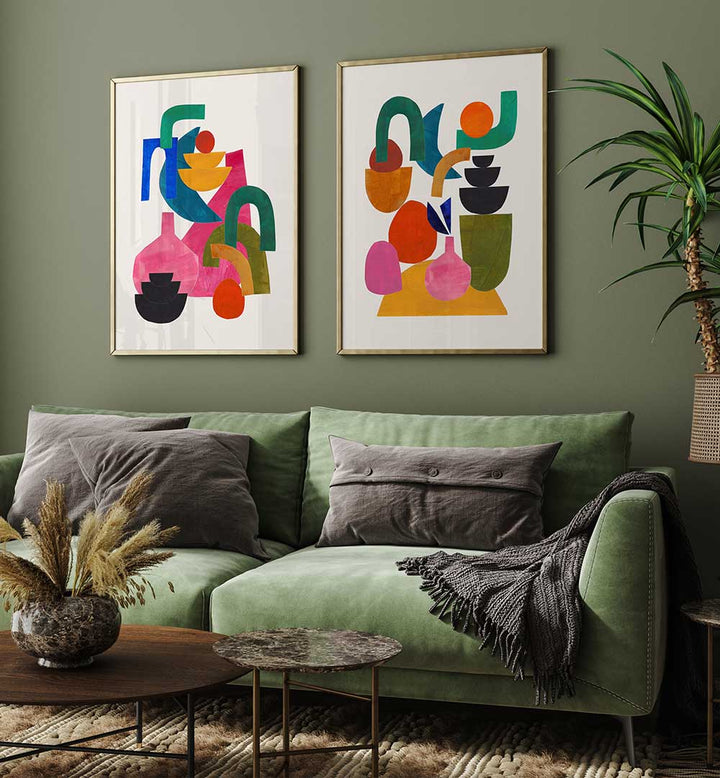 Living room with green sofa, abstract art on the wall, and decorative elements.