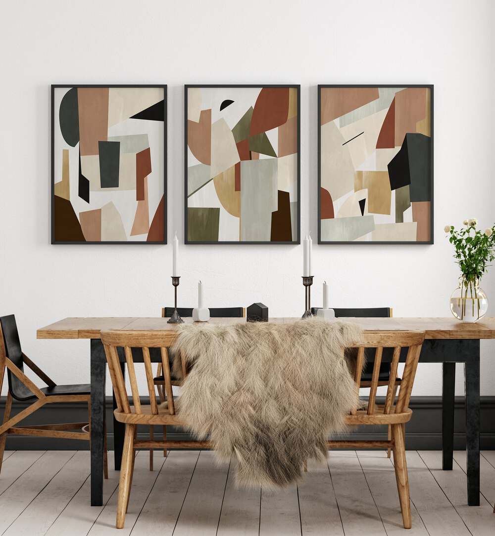 Nordic Shapes Set Set Of 3 Paintings in Black Plain Frame placed on a wall behind a dining table a for dining area