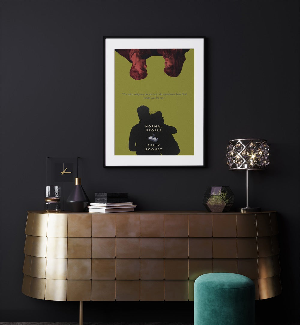 Normal People By Grishma Korjani Movie Posters in Black Frame With Mount placed on a Dark Blue Colored Wall in the Drawing Room