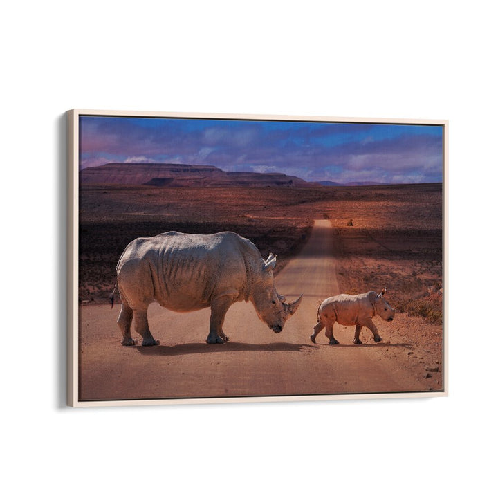 Majestic rhinos crossing a road, featured in RHINOS CROSSING, PHOTOGRAPHY PRINTS collection. Perfect for wildlife lovers.