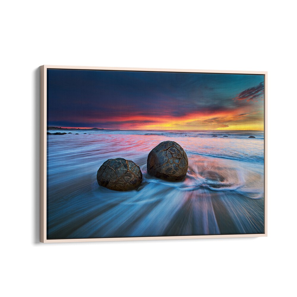 Stunning Moeraki Boulders at sunset, perfect for unique Moeraki Boulders, photography prints that capture nature’s beauty.
