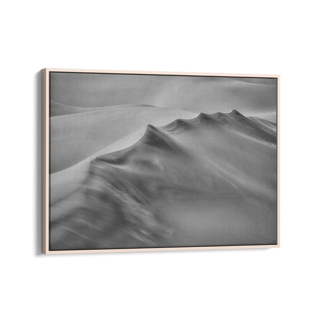 Stunning BLOWING SAND, PHOTOGRAPHY PRINTS in a sleek frame, capturing nature's beauty and dynamic landscapes.