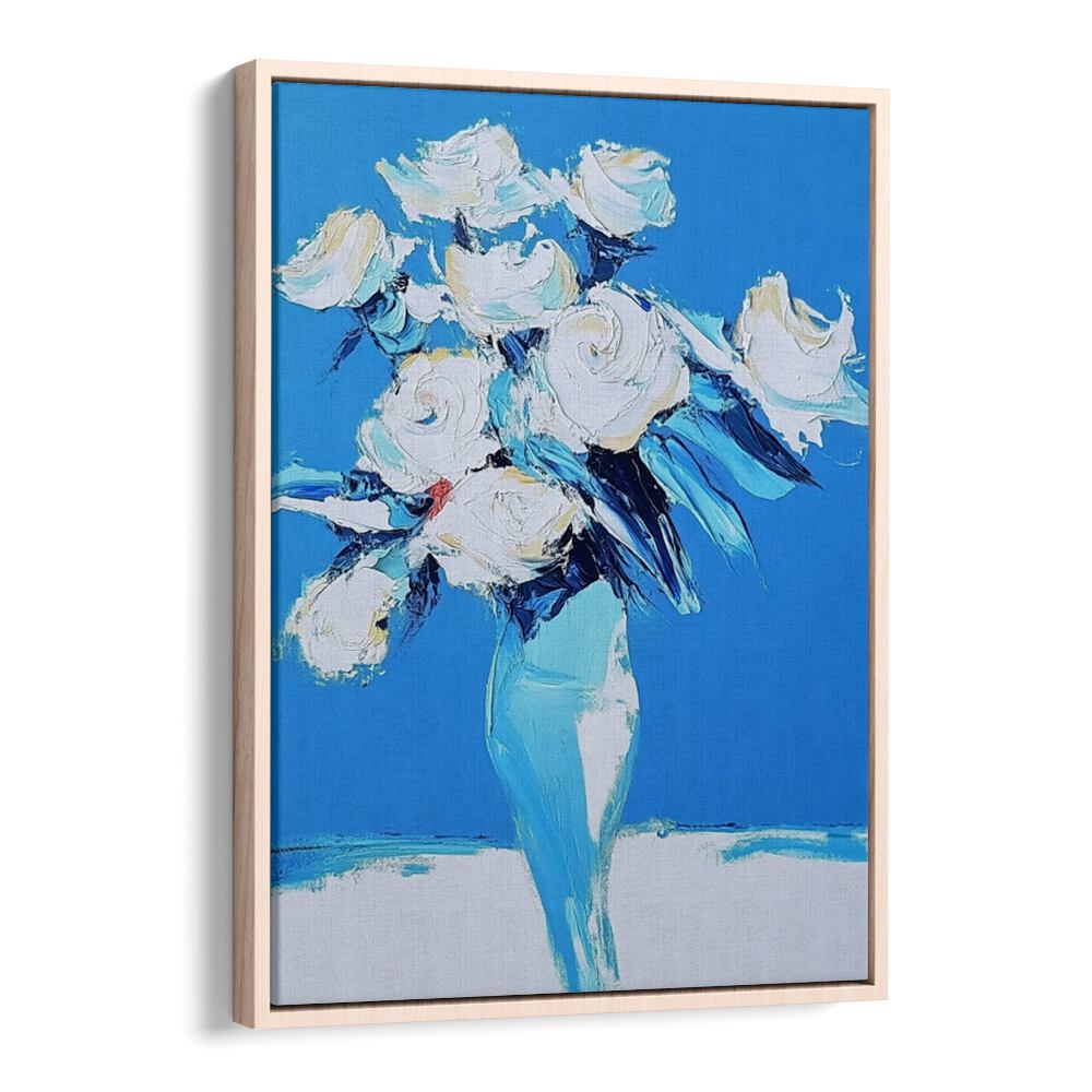Stunning white roses in a blue vase, perfect for enhancing home decor with elegance and charm.