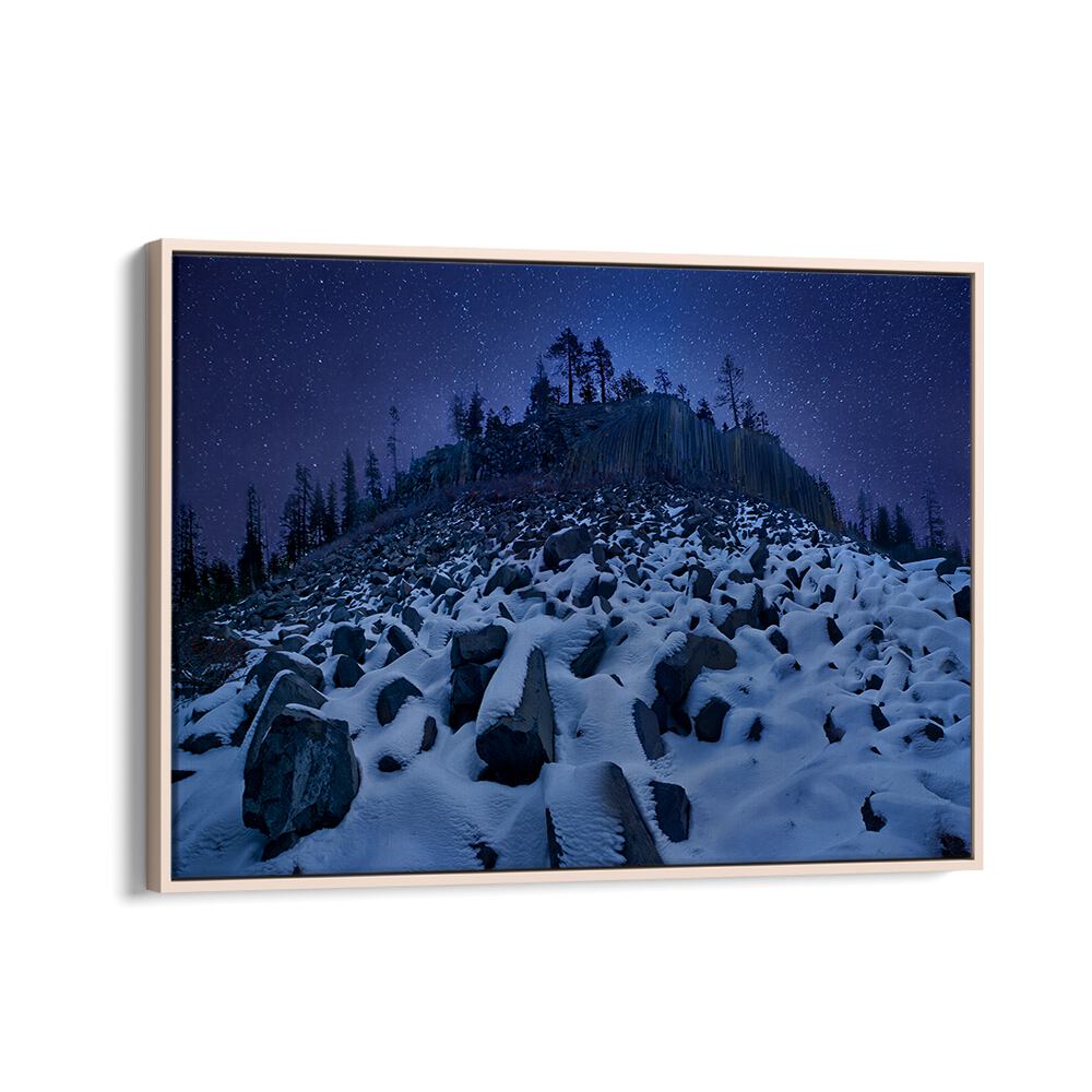 Stunning COLD MOUNTAIN DEVILS POSTPILE, PHOTOGRAPHY PRINTS capturing a snowy landscape under a starry night sky.