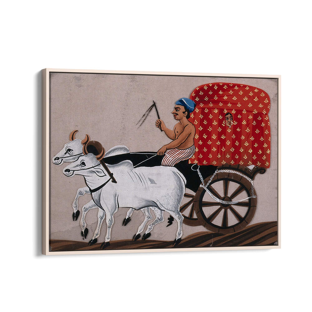 A MAN DRIVING A BULLOCK