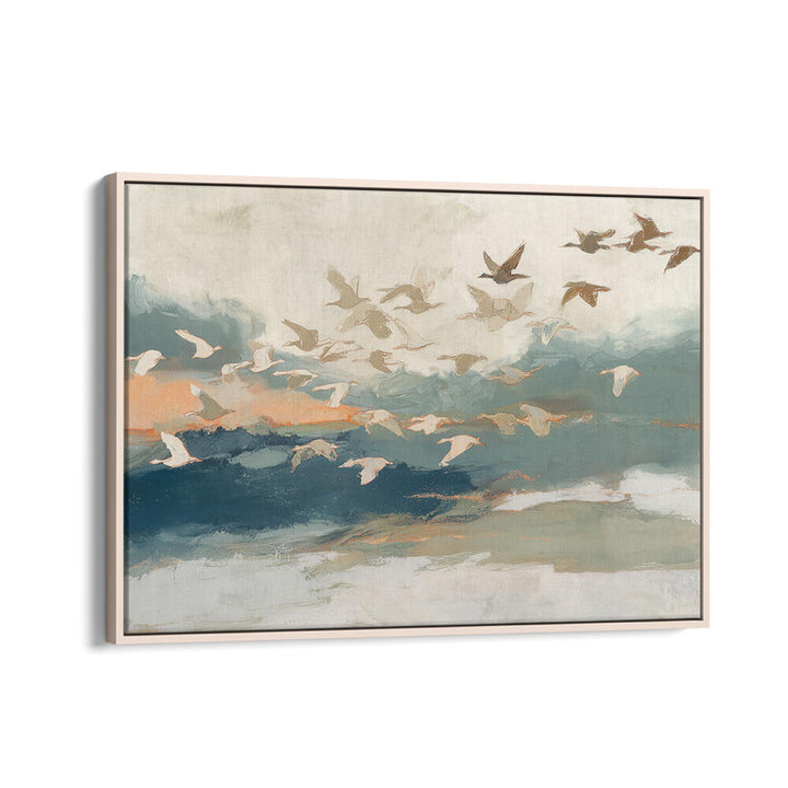 BIRDS IN FLIGHT AT DUSK OVER OPEN WATER