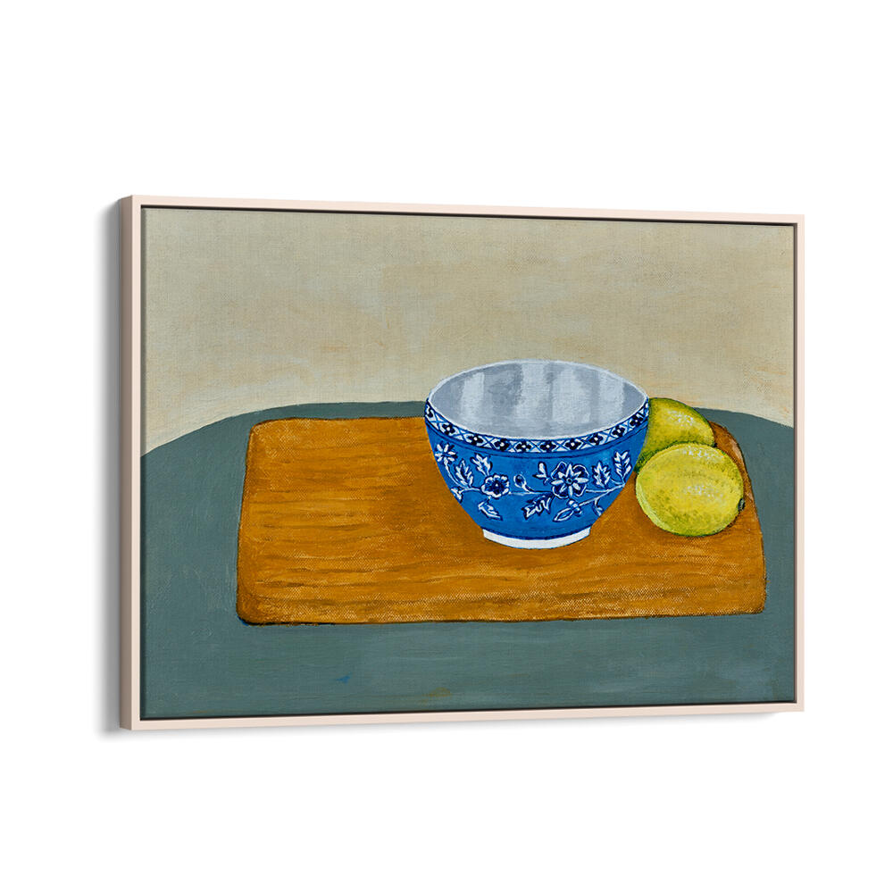 Bright blue bowl with fresh lemons on a wooden surface, perfect for vibrant LEMONS, KITCHEN POSTERS decor.