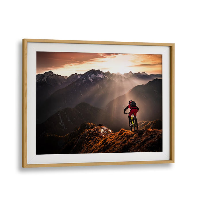 Mountain biker enjoying a stunning sunset view, featured in JUST RIDE, PHOTOGRAPHY PRINTS collection.