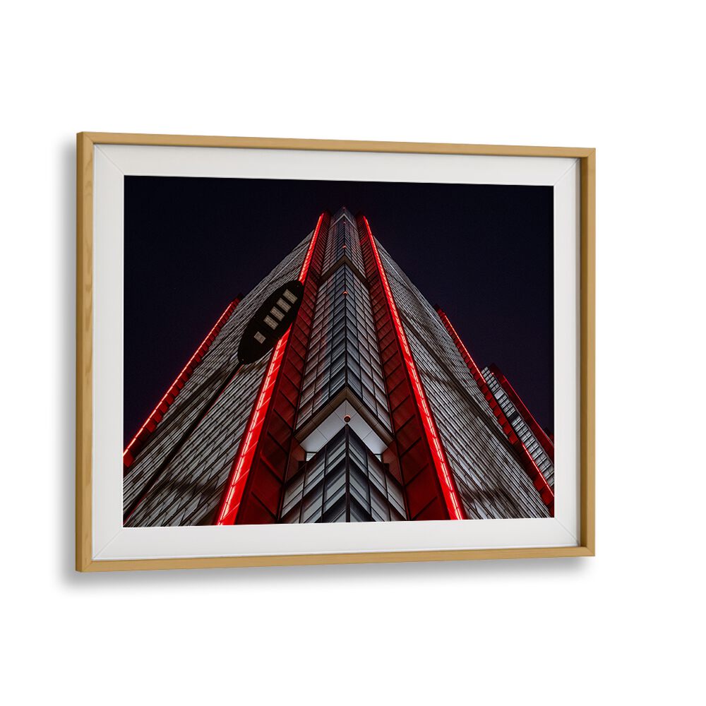 Urban skyscraper illuminated by red lights, showcasing the essence of city life—RED LINE, PHOTOGRAPHY PRINTS.
