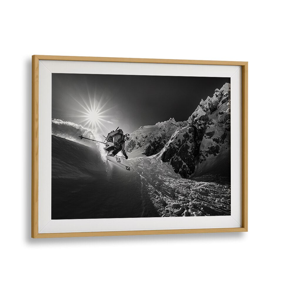 Dynamic skiing action captured in SNOW SPLASH OVER THE EDGE, PHOTOGRAPHY PRINTS, showcasing thrilling winter sports.