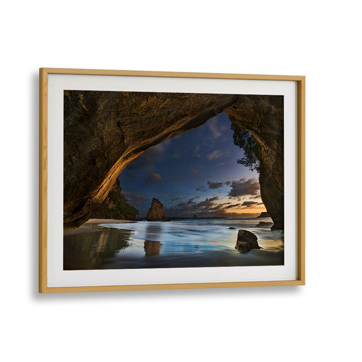 Framed Cathedral Cove photography prints showcasing stunning coastal landscapes, perfect for enhancing any space.