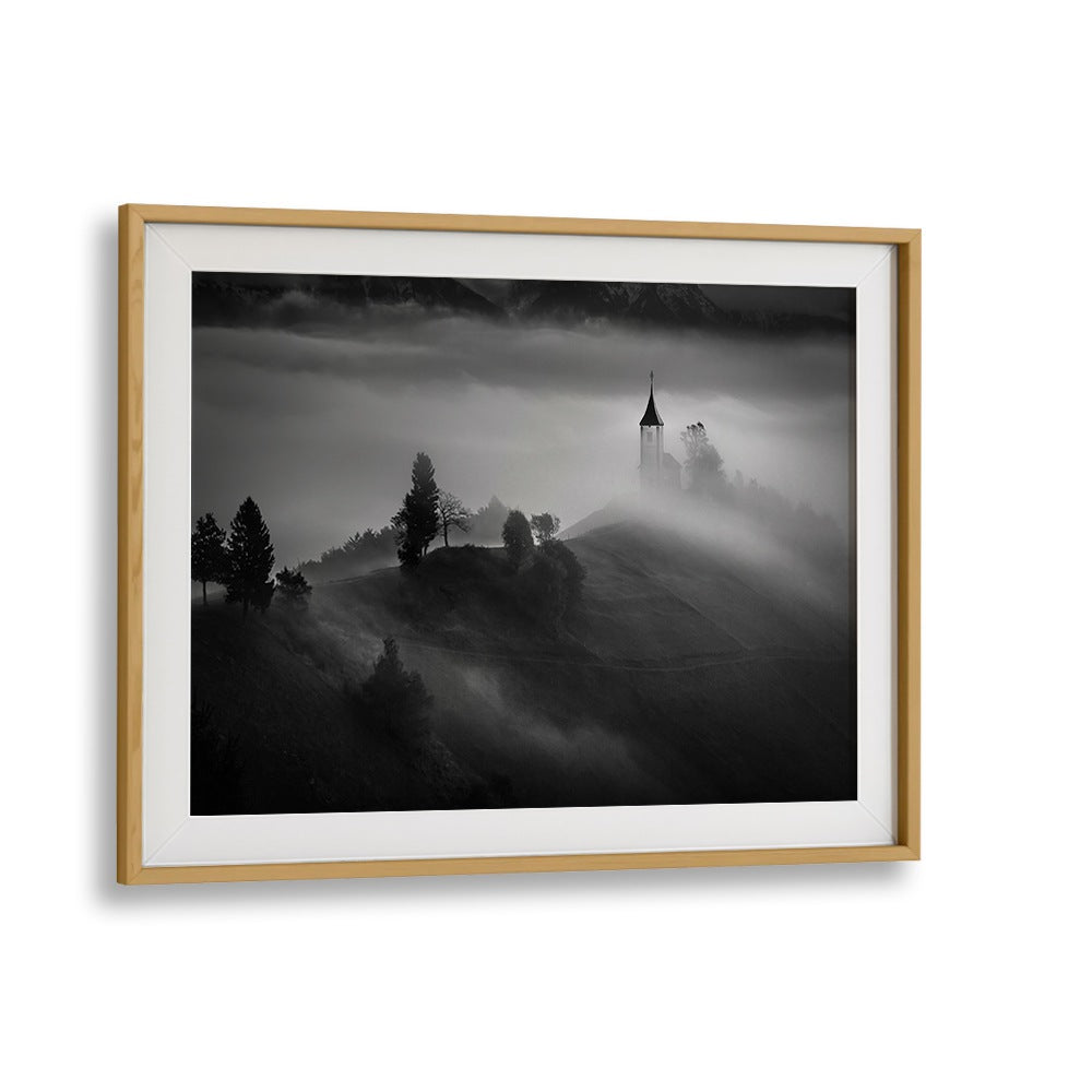 Serene landscape featuring a church shrouded in fog, perfect for OUT OF THE MIST, PHOTOGRAPHY PRINTS collection.