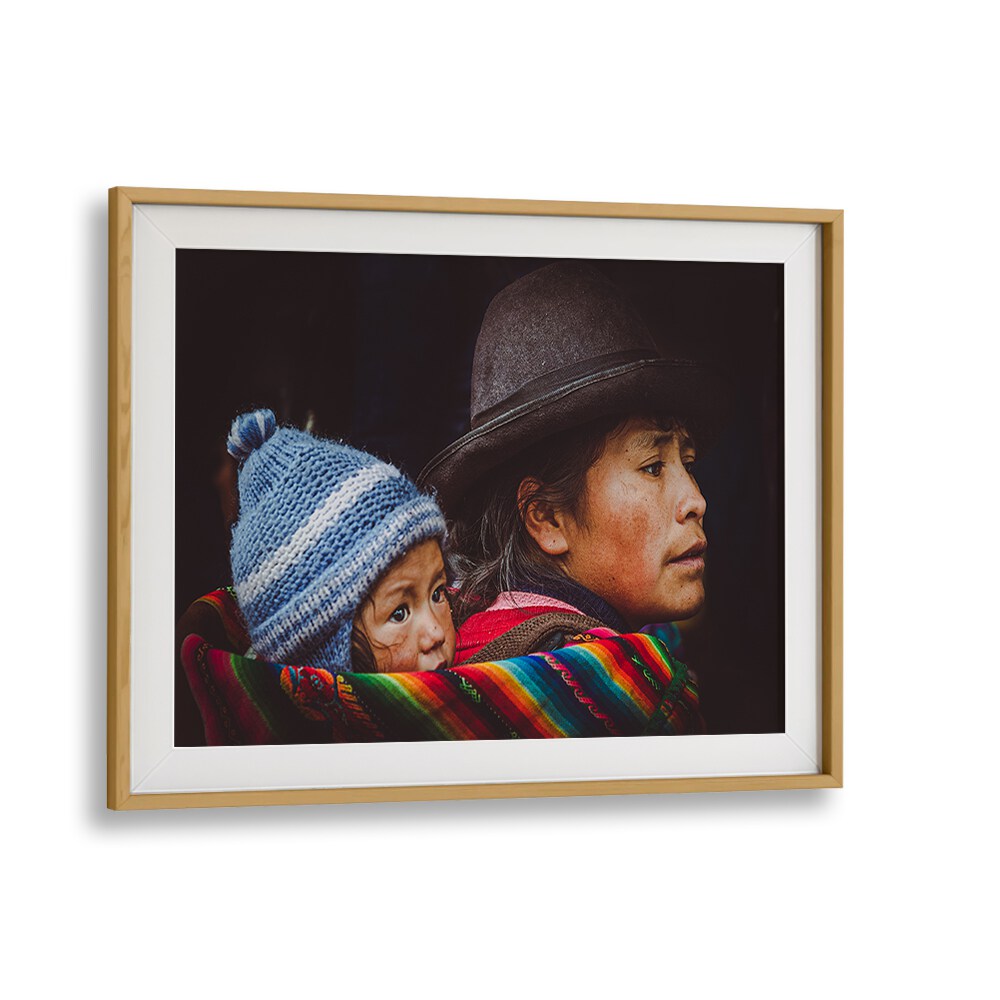 Embrace urban life with CUSCO STREET II, PHOTOGRAPHY PRINTS, showcasing a mother and child in vibrant colors.