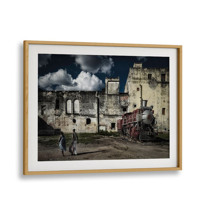 Captivating HAVANA TRAIN, PHOTOGRAPHY PRINTS showcasing urban life with a vintage train against historic Havana architecture.