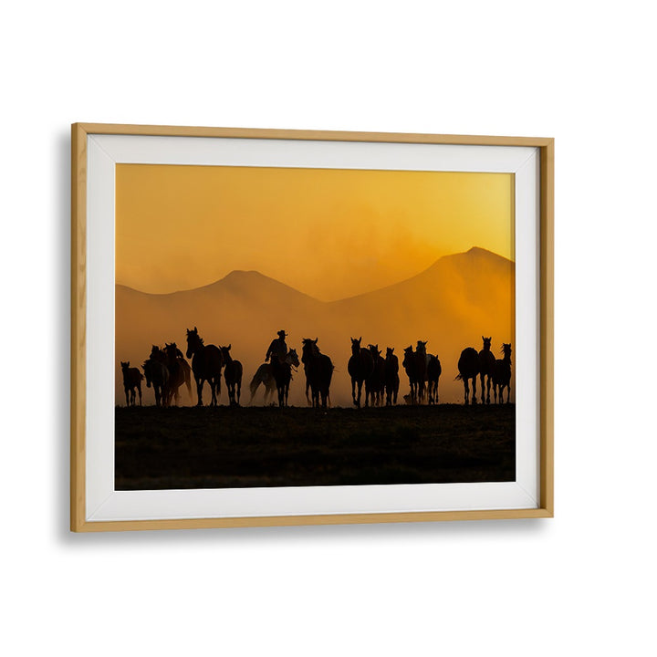Breathtaking horses silhouetted at dusk in "AS THE SUN GOES DOWN, PHOTOGRAPHY PRINTS" collection, perfect for nature lovers.