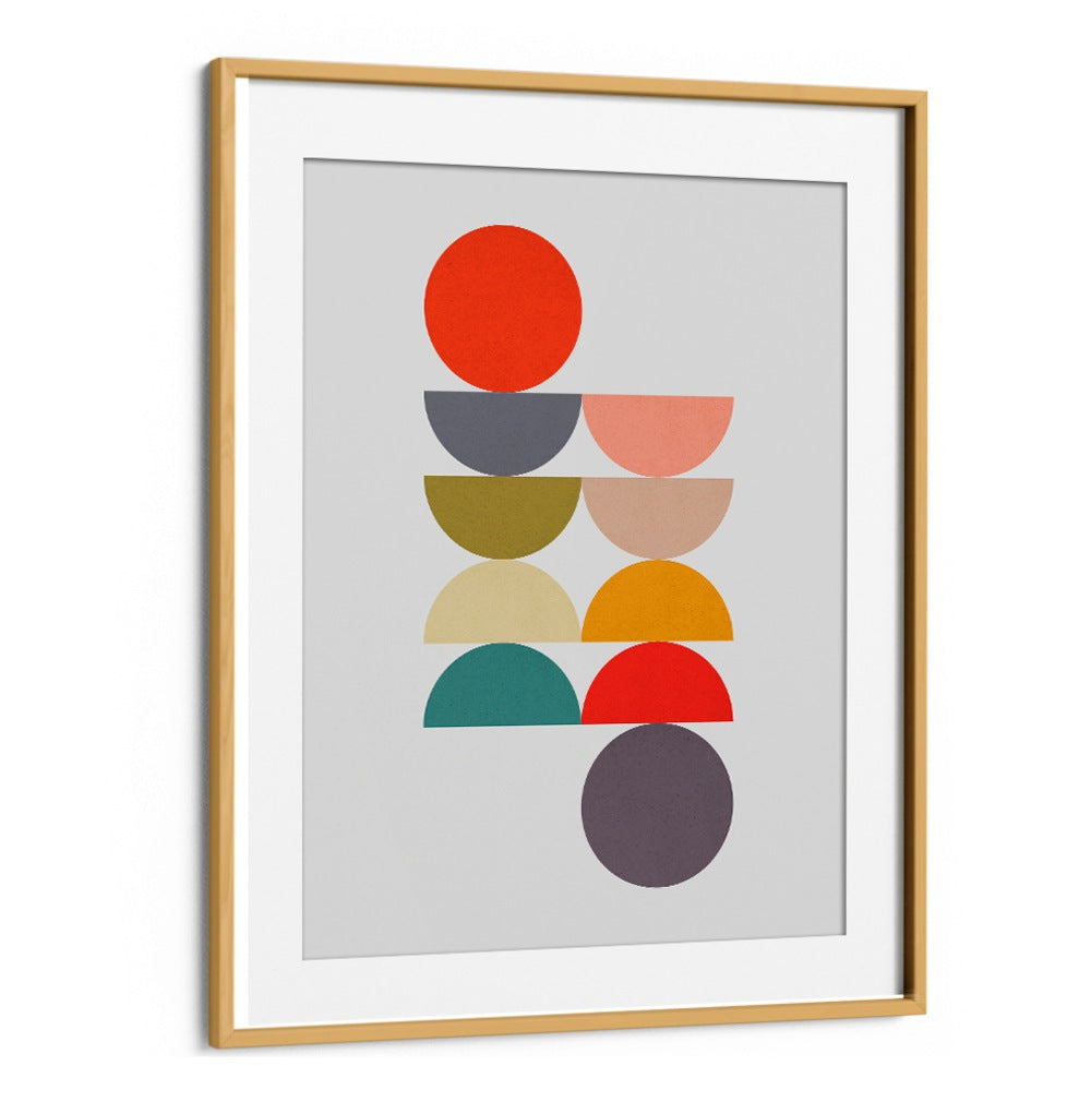 CIRCLES IN HARMONY III, GEOMETRIC ART PRINTS feature vibrant, stacked circles for a balanced and tranquil decor.