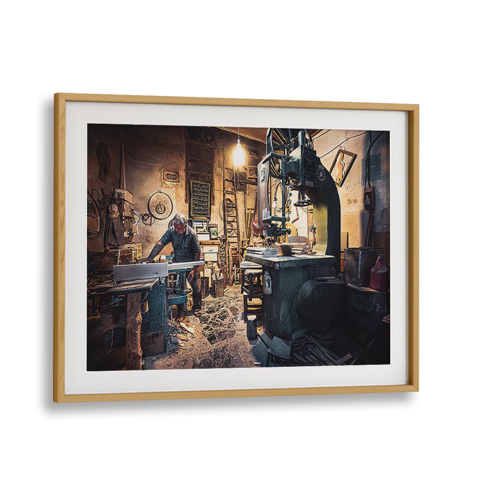 Framed photography print from THE CARPENTER'S WORKSHOP, showcasing a craftsman in a rustic workshop environment.