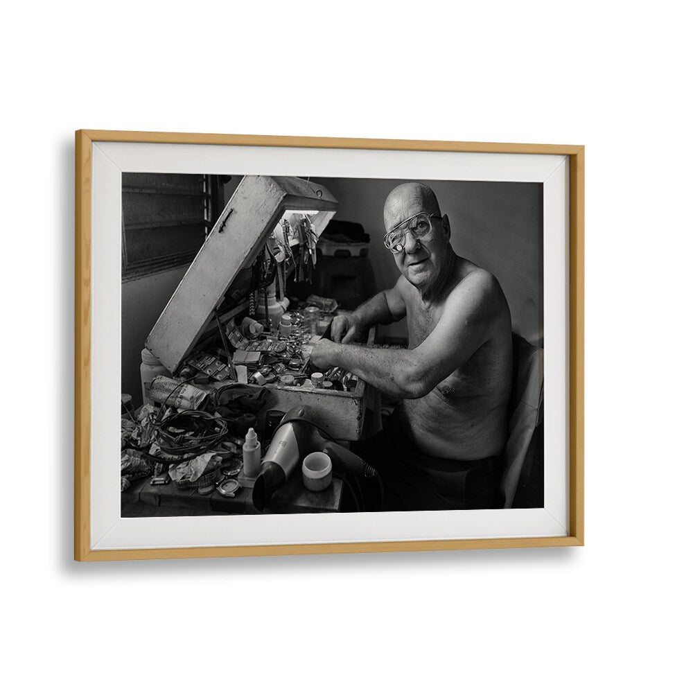 CUBAN CLOCKMAKER, PHOTOGRAPHY PRINTS showcase a skilled artisan immersed in the vibrant art of time and photography.