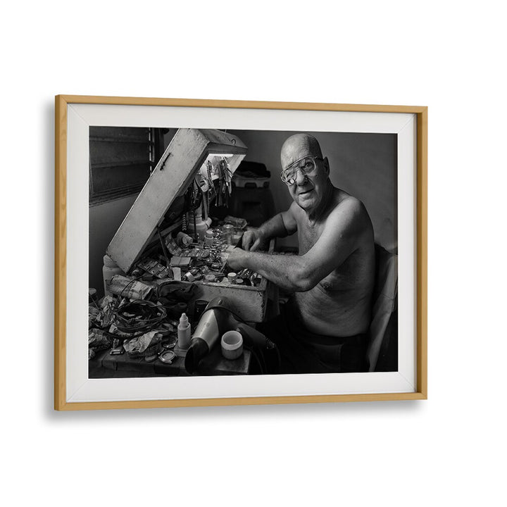 CUBAN CLOCKMAKER, PHOTOGRAPHY PRINTS showcase a skilled artisan immersed in the vibrant art of time and photography.