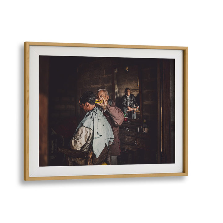 Barber of Inle Lake, photography prints showcasing a masterful street art moment in a serene barber shop setting.