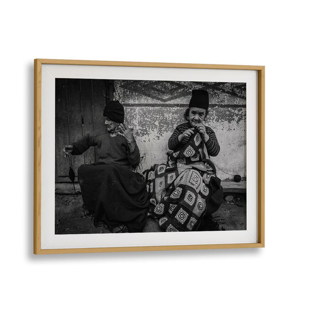Captured in black and white, "Knitting Sisters" photography prints showcase the beauty of community and connection.