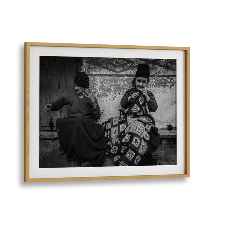 Captured in black and white, "Knitting Sisters" photography prints showcase the beauty of community and connection.