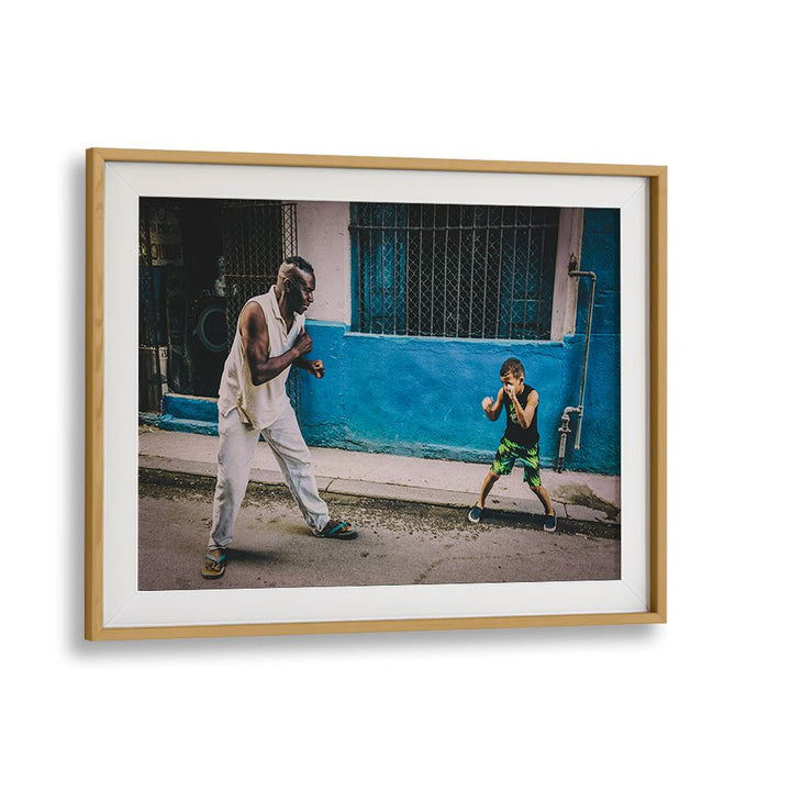Dynamic scene of a child and adult sparring, showcasing the spirit of the NEXT CHAMP, PHOTOGRAPHY PRINTS collection.