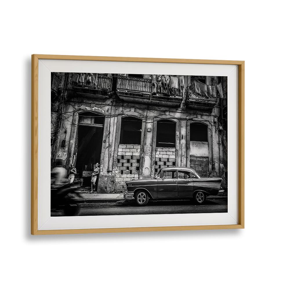 Elegant black and white photography print showcasing urban life on Habana Street, capturing its vibrant essence.