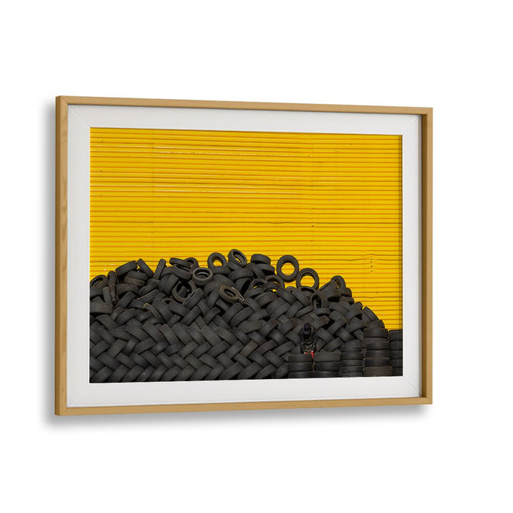 Explore vibrant TIRES , PHOTOGRAPHY PRINTS showcasing urban life artfully framed against a striking yellow background.