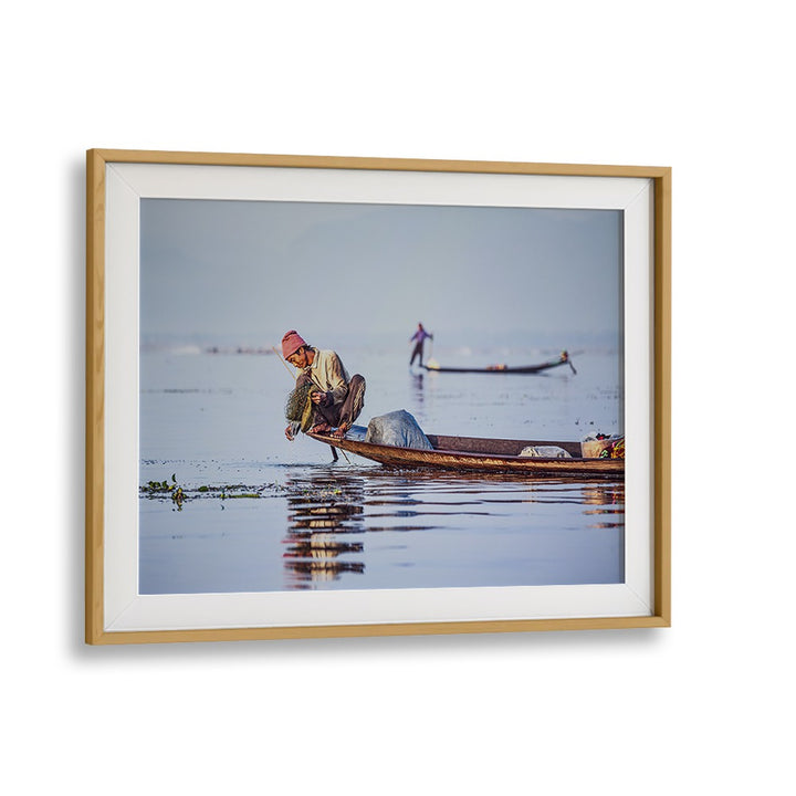 Fishermen at sunrise, photography prints capturing tranquil morning scenes on serene waters. Perfect for your decor.