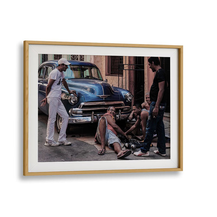 Street scene capturing urban artistry and community, showcasing the process of repairing a car, photography prints.