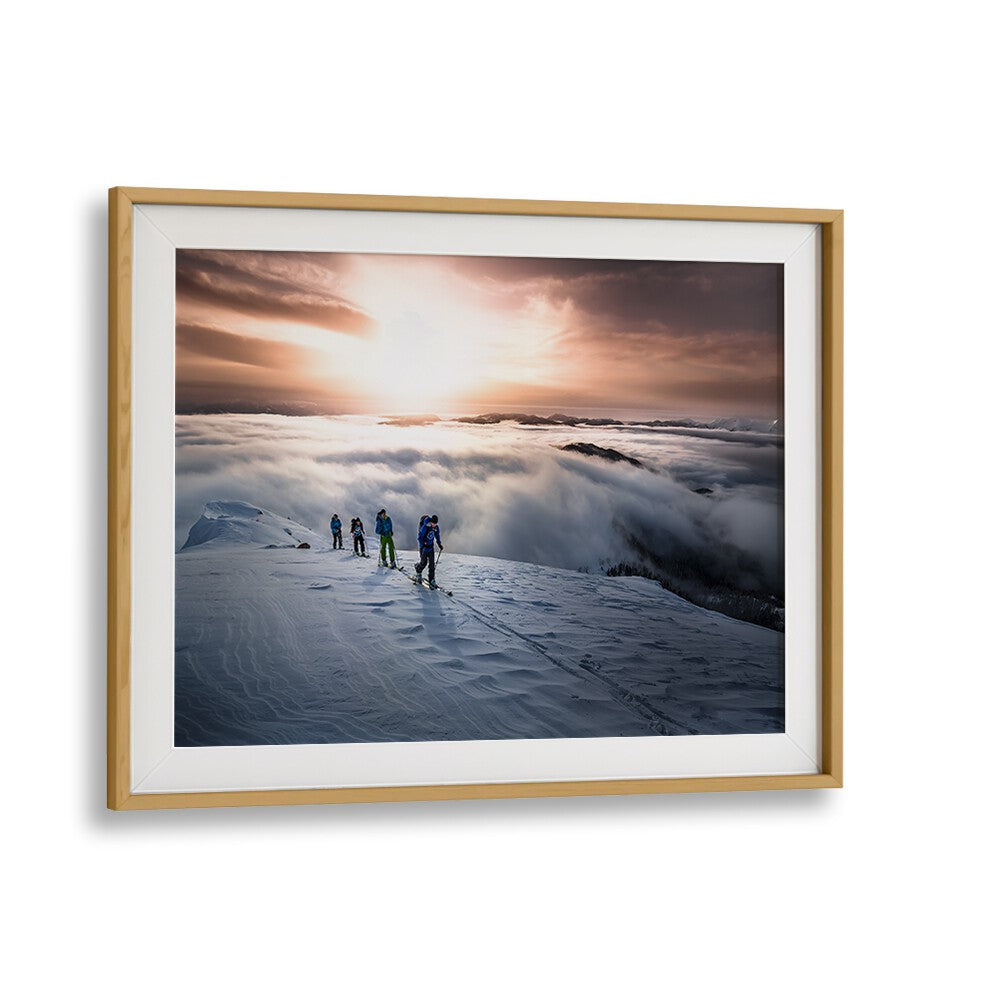 Stunning “HIGH ABOVE THE FOG, PHOTOGRAPHY PRINTS” showcases adventurers against a breathtaking foggy landscape.