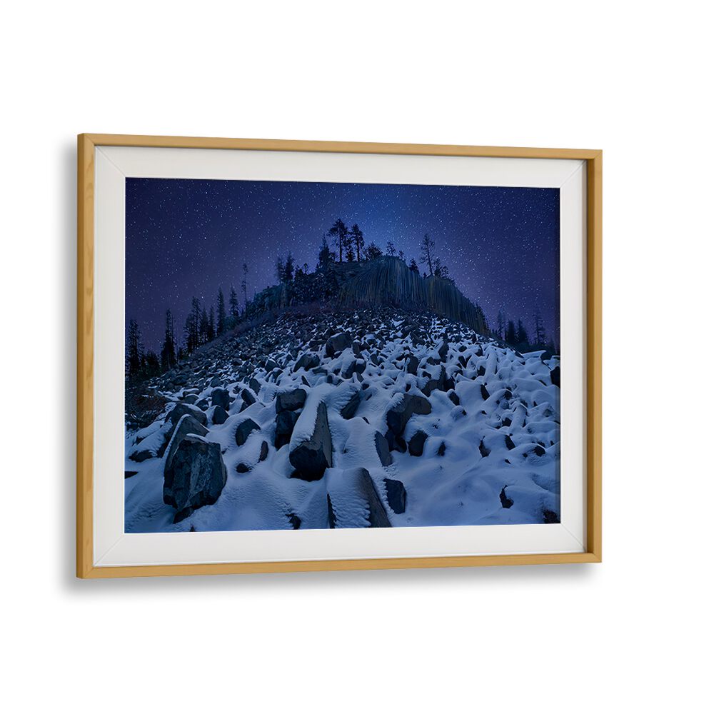 Breathtaking COLD MOUNTAIN DEVILS POSTPILE, PHOTOGRAPHY PRINTS showcasing a serene snowy landscape under a starry sky.