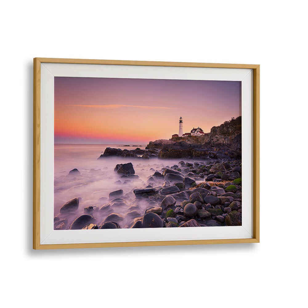 Stunning Portland Headlight photography prints showcasing the iconic lighthouse against a vibrant sunset.