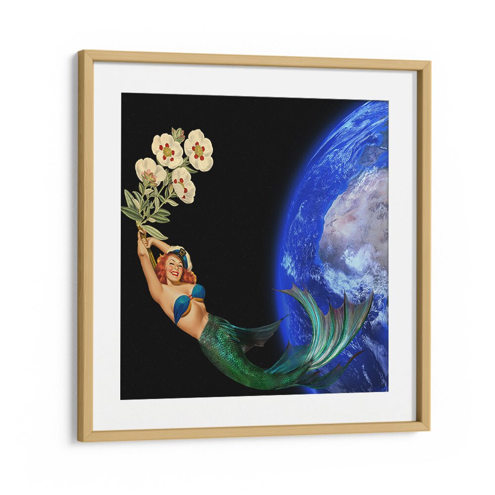 Mermaid holding flowers floats near Earth in this enchanting SWIMMING AWAY, SURREAL ART PRINTS. Perfect for unique decor!