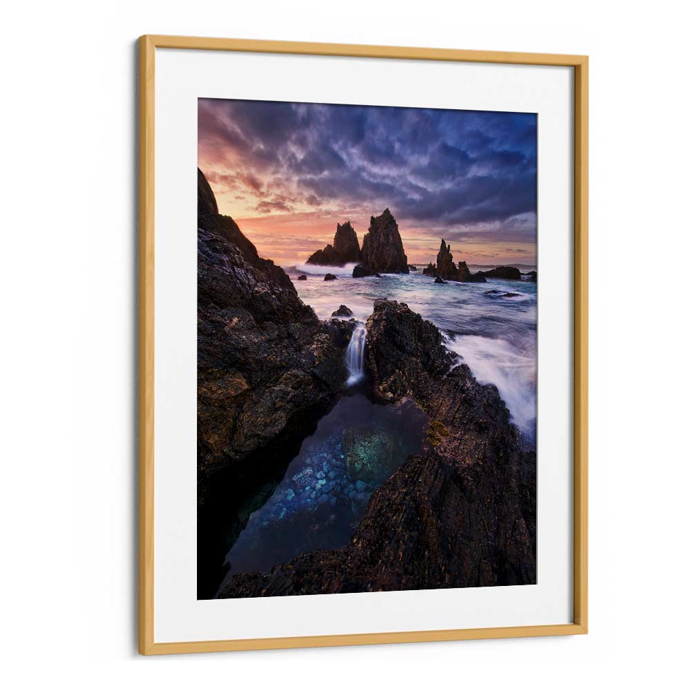 Stunning MEETING OF WATERS, PHOTOGRAPHY PRINTS showcasing rugged coastline and vibrant sunset, perfect for any room.