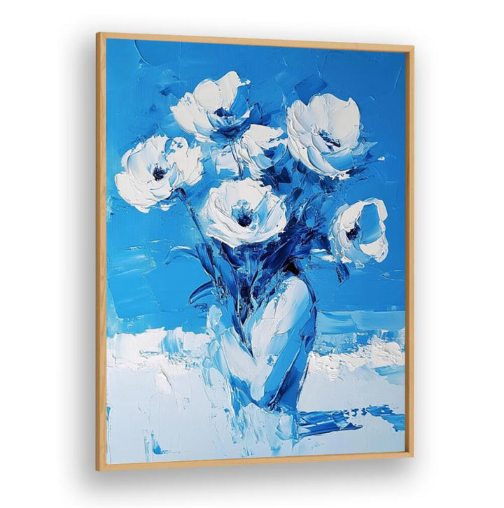 Vibrant BLUE FLOWERS in a striking blue vase, perfect for enhancing your home decor with elegance and charm.